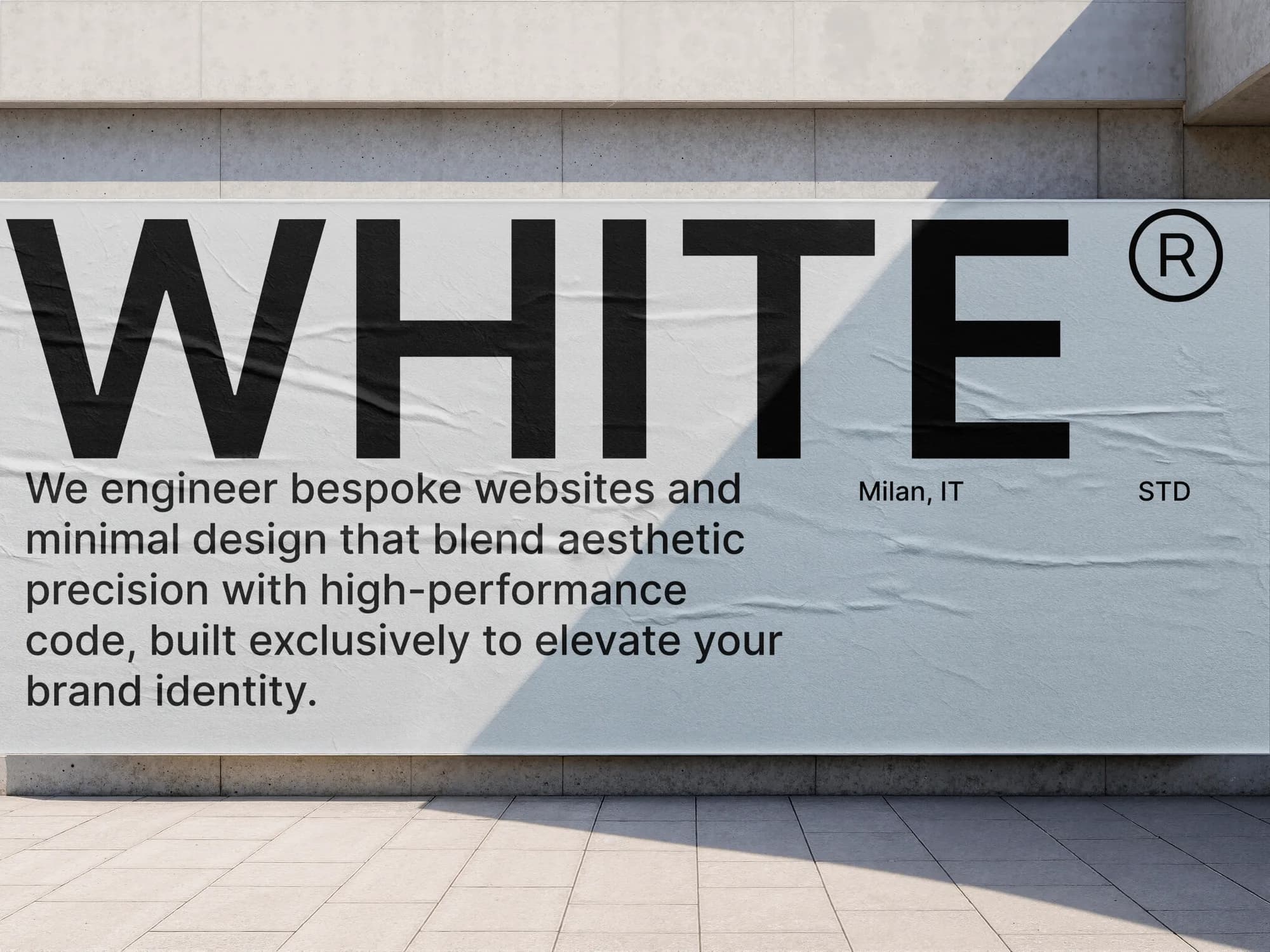 The WHITE hero printed on a street billboard