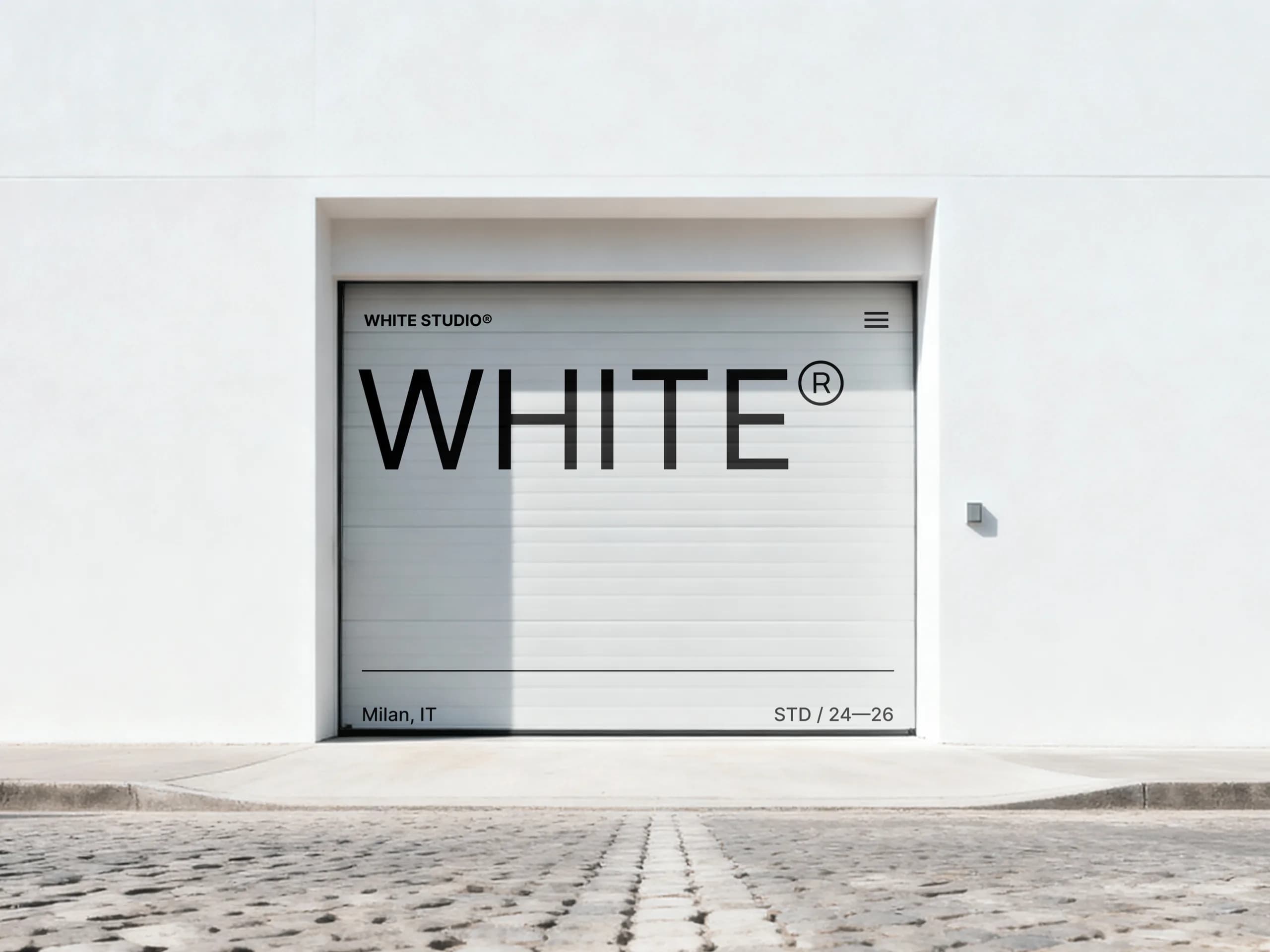 A white garage door with the WHITE® wordmark