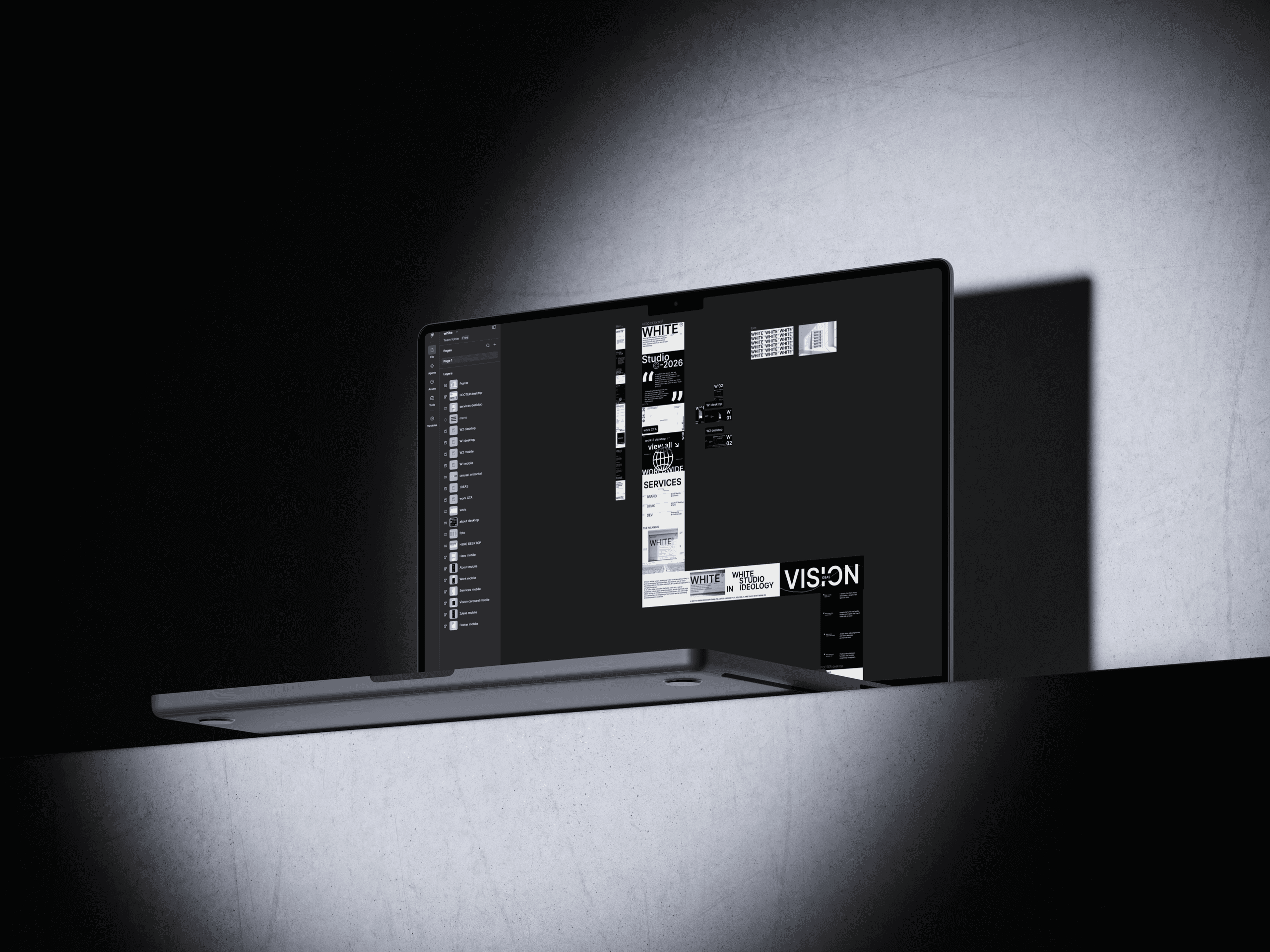WHITE Studio design on a laptop